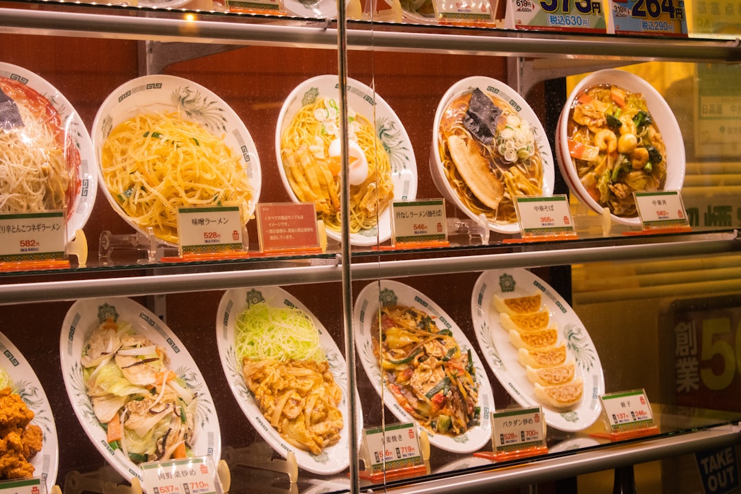 Display case filled with branded food items and restaurant merchandise, illustrating offline restaurant marketing strategies