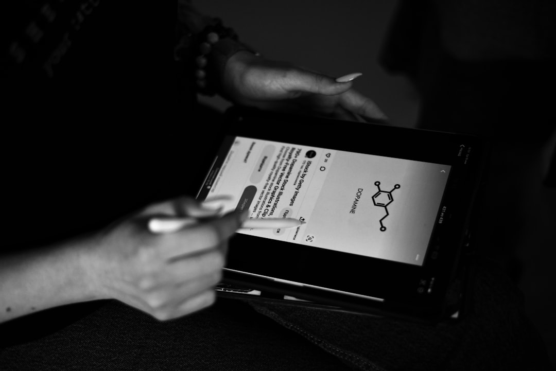 Server completing POS training on a tablet with stylus during onboarding