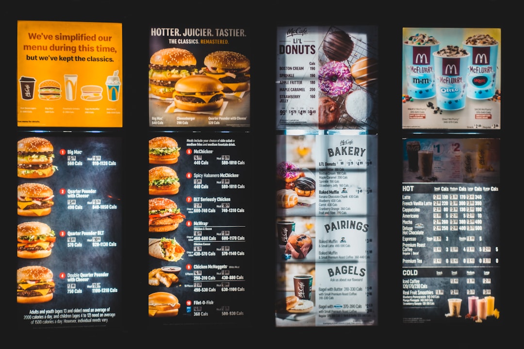 Fast-food style digital menu boards organized by categories and prices for clear customer navigation