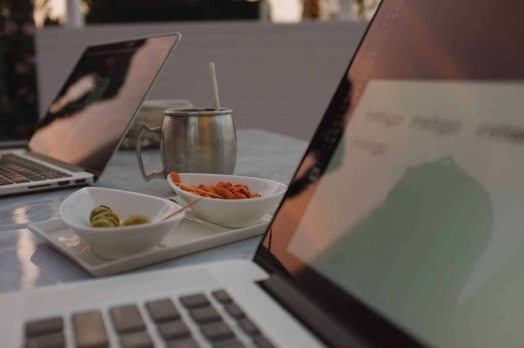 Restaurant analytics concept with laptop and glasses on desk