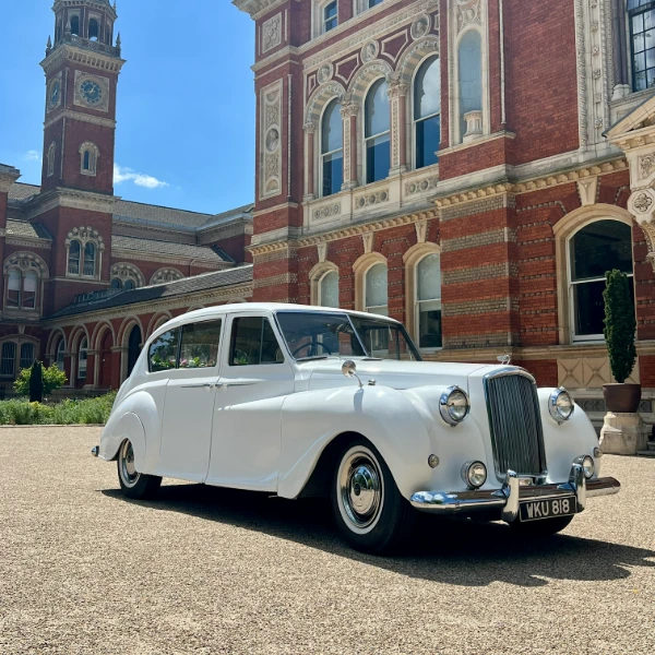 White Austin Princess vintage wedding car