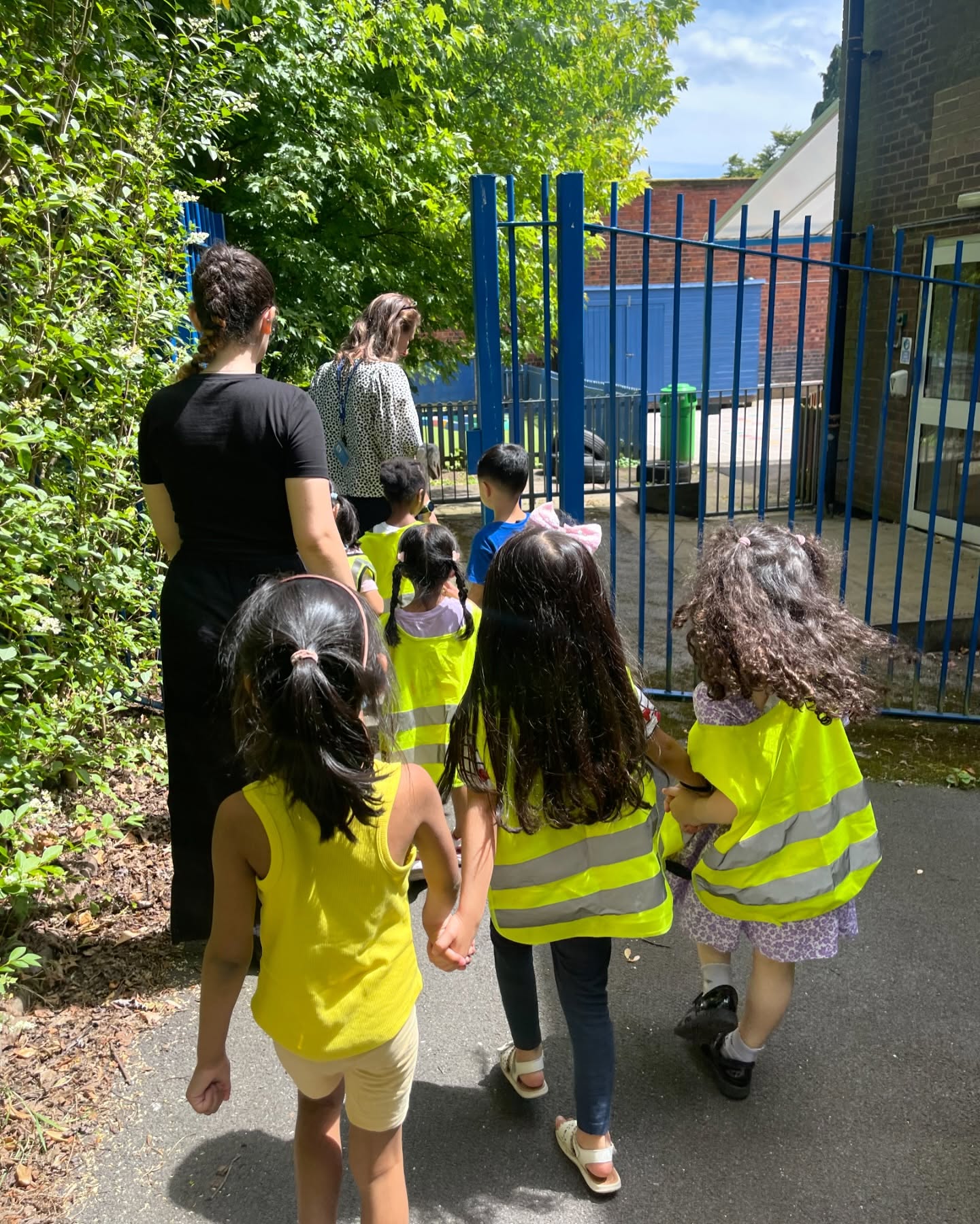 Child supervised while walking outside at children’s nursery near me