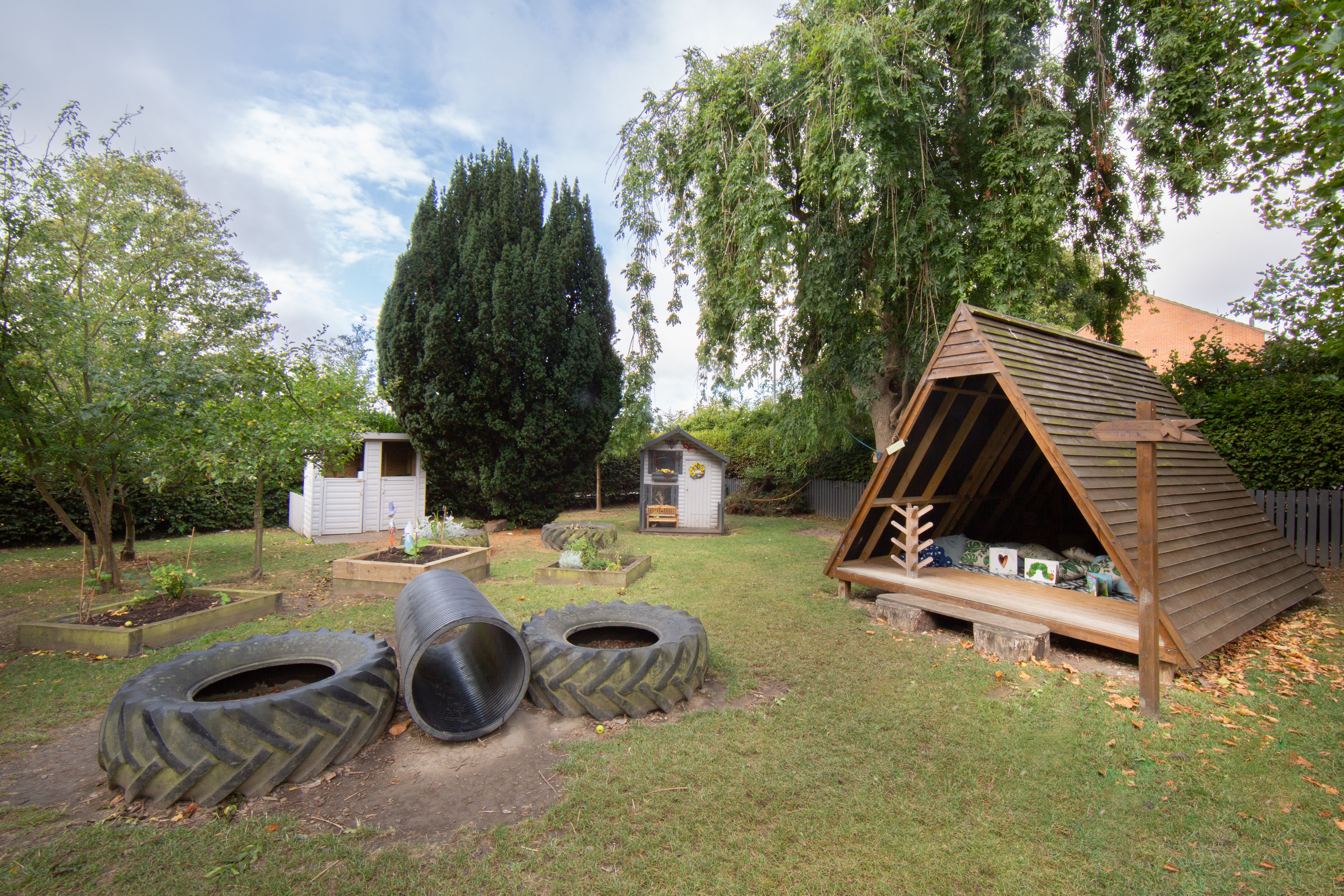 chesterfield nursery, Storal Nurseries Chesterfield, Nature-inspired nursery garden, Safe and secure outdoor play area, Gross motor skill development activities