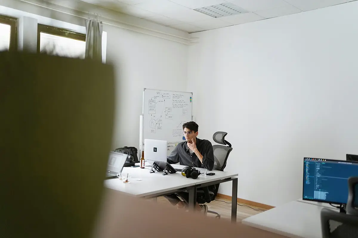 Stockimage of an office working sitting at his desk.