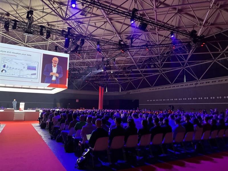Full room with participants at the event