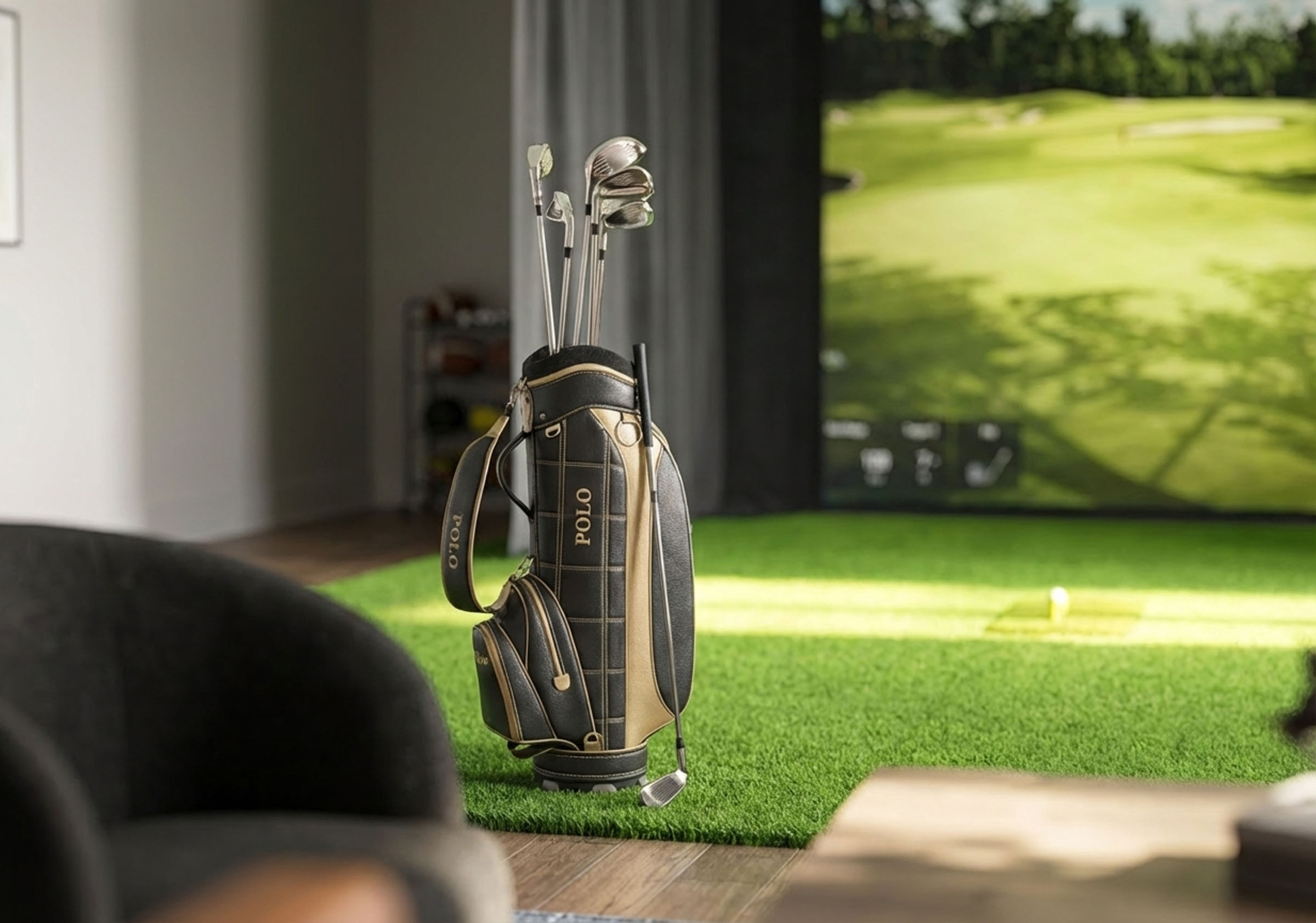 Golf simulator lounge with clubs, putting turf, and seating.