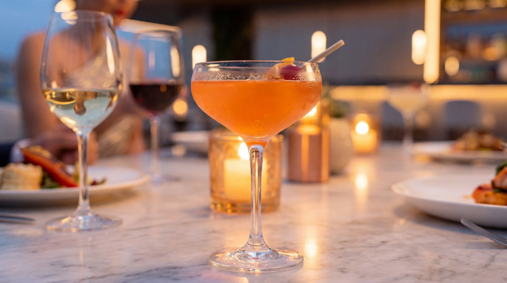 Ambassadori Island vibe shot of a cocktail on a candlelit table - Batumi, Georgia