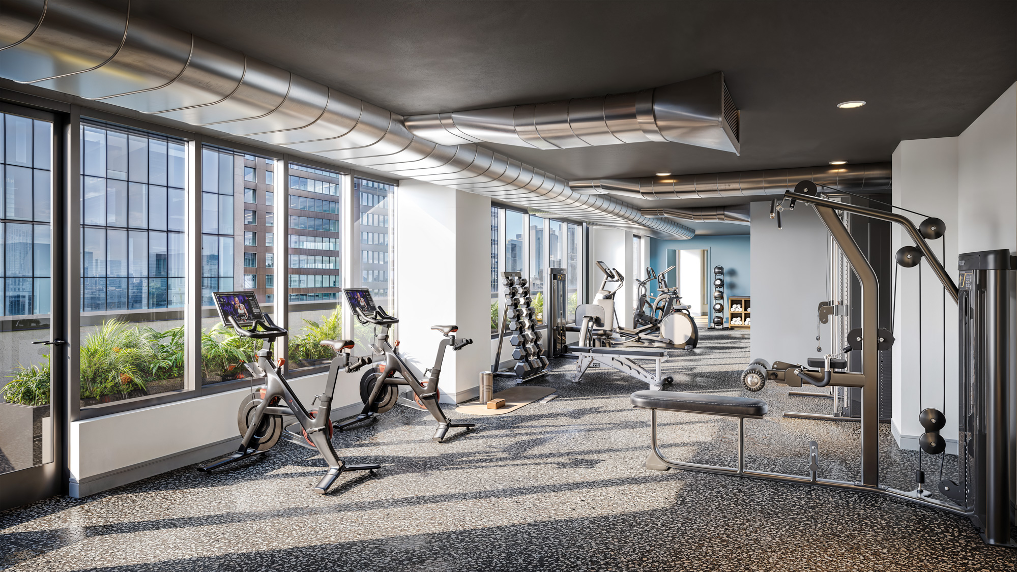Willoughby interior rendering of the fitness center with floor-to-ceiling windows - Brooklyn, New York