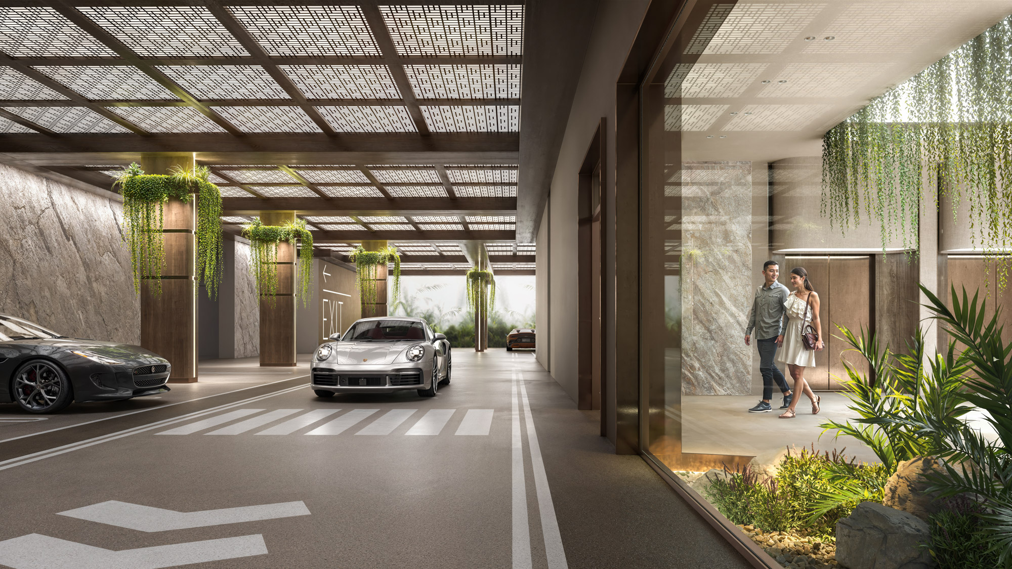 Modern apartment community parking entrance with landscaped surroundings