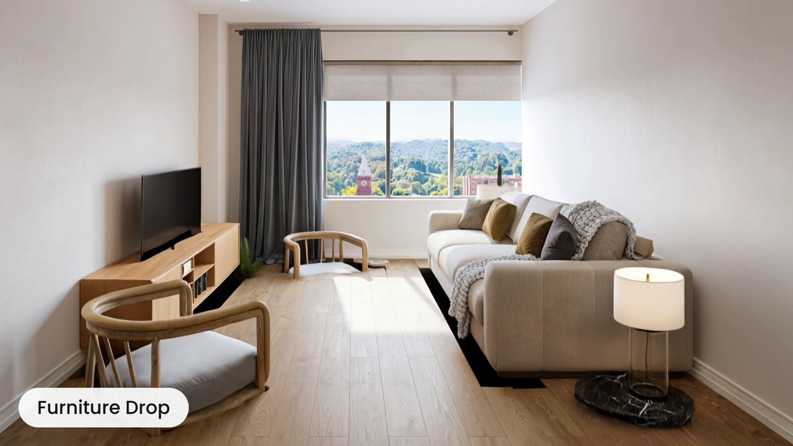 Apartment living room staged with sofa, media unit, and decor