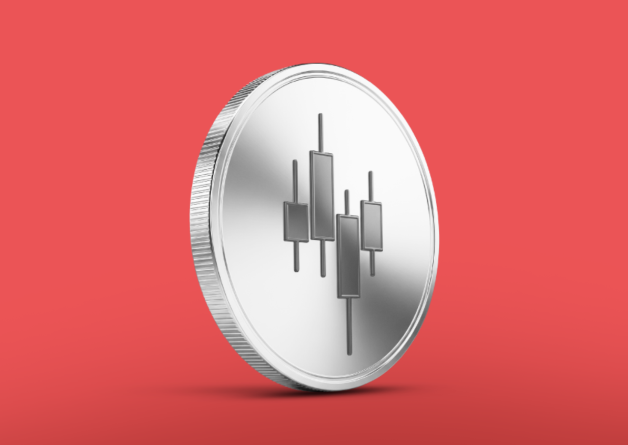 A silver coin standing upright against a red background, featuring a candlestick chart symbol engraved on its surface.