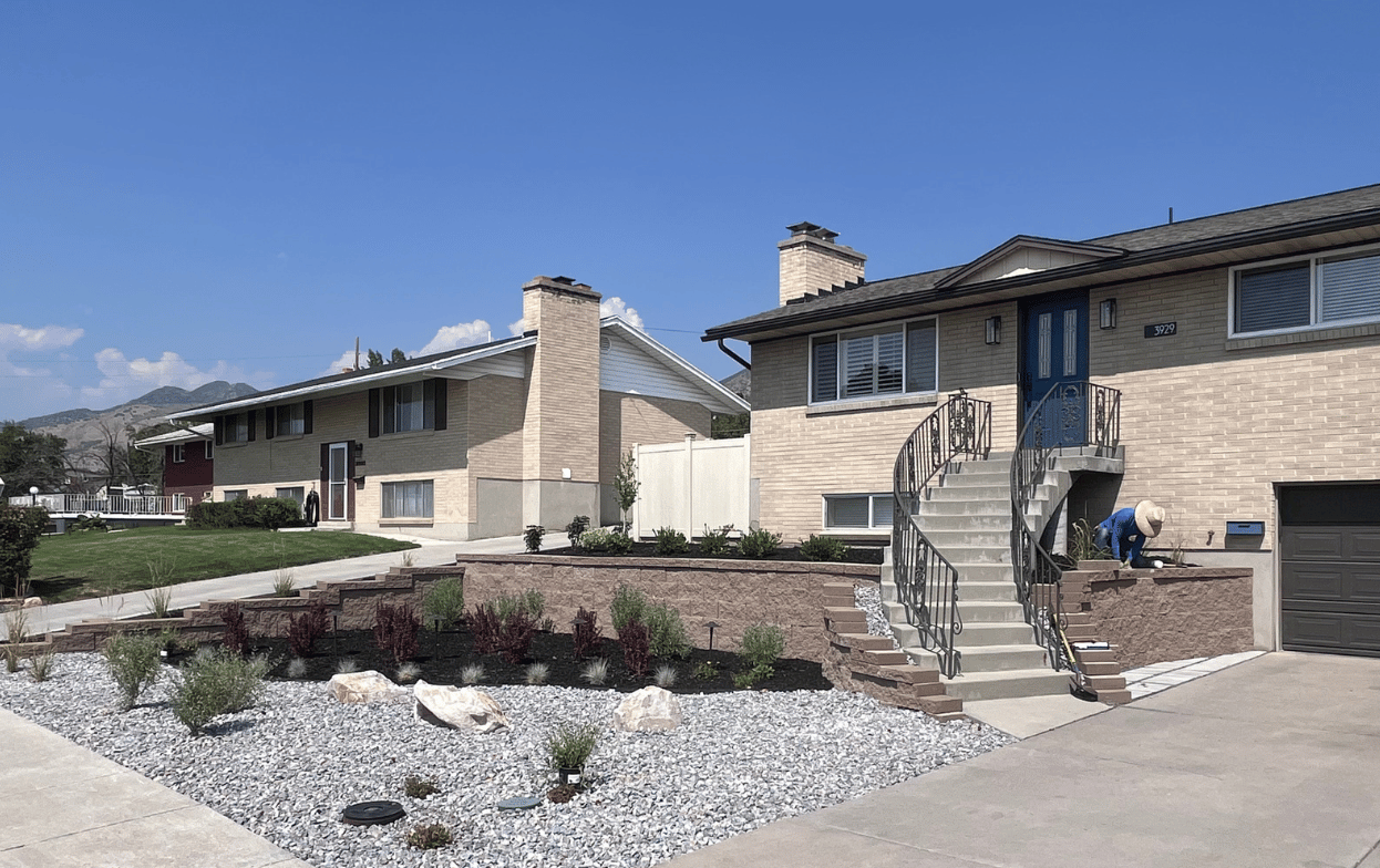 Xeriscaping and retaining wall installation by Activescapes Landscaping at a residence in Woods Cross, Utah