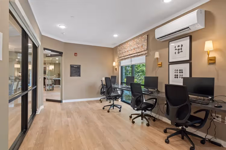 business center with computers and desks