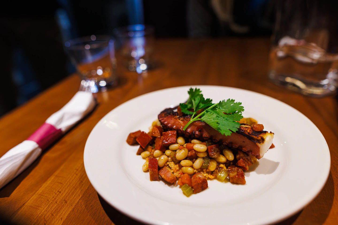 Plated grilled octopus dish