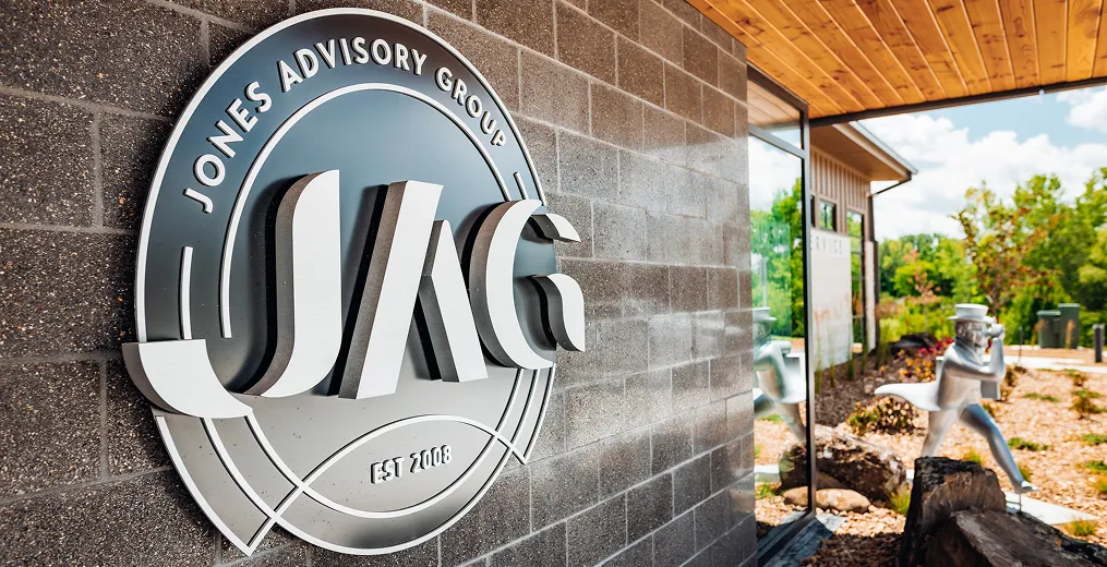 Shot of Jones Advisory Group's logo on the outside of their new office in Topeka, KS.
