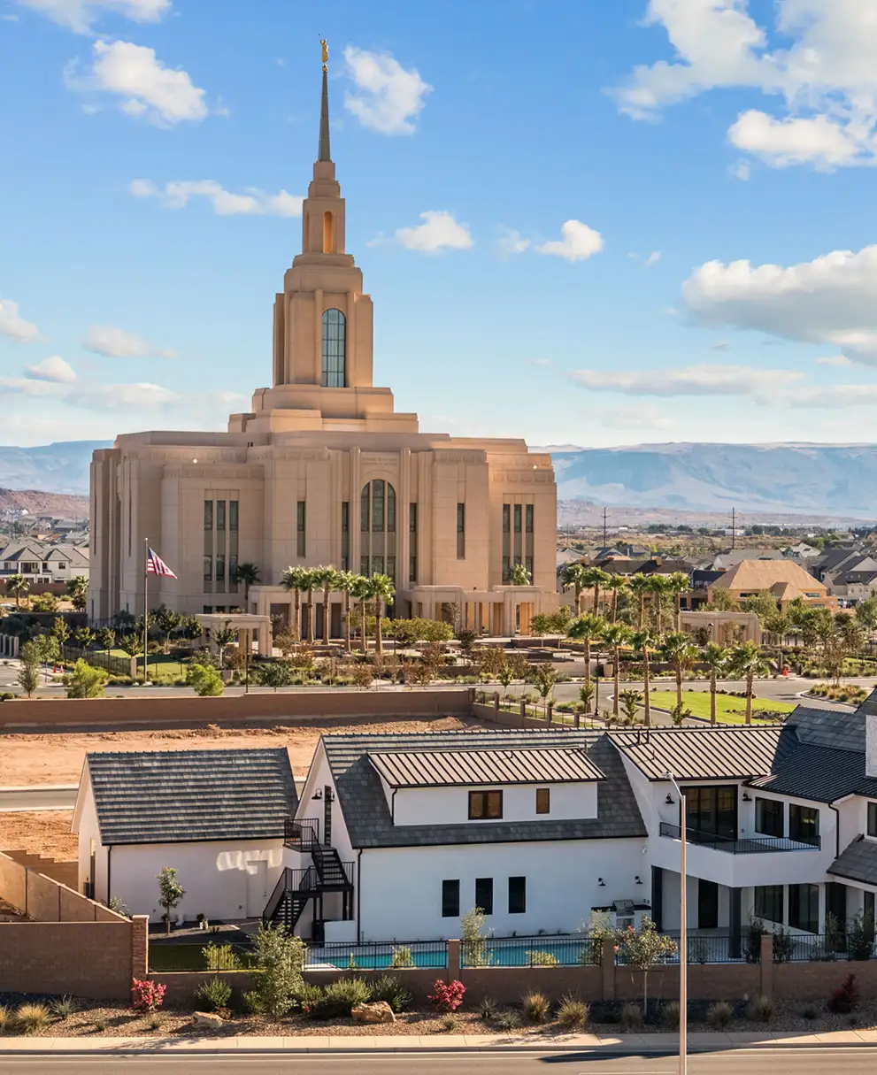 Aerial view of Summit View luxury homes with temple and desert mesa skyline in the background