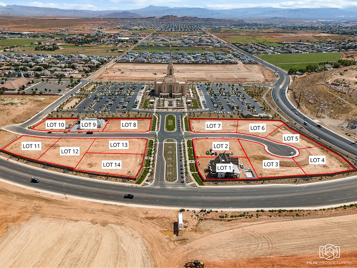 Aerial view of 14 available homesites at Cedar Pointe community near the St. George Utah Temple with lot boundaries outlined in red.