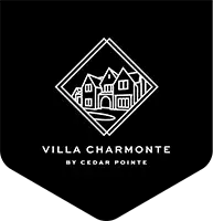 Diamond-shaped "Villa Charmonte by Cedar Pointe" emblem with home illustration on black pennant background.