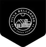 Circular "Villa Bellarose by Cedar Pointe" badge with home illustration on black pennant background.