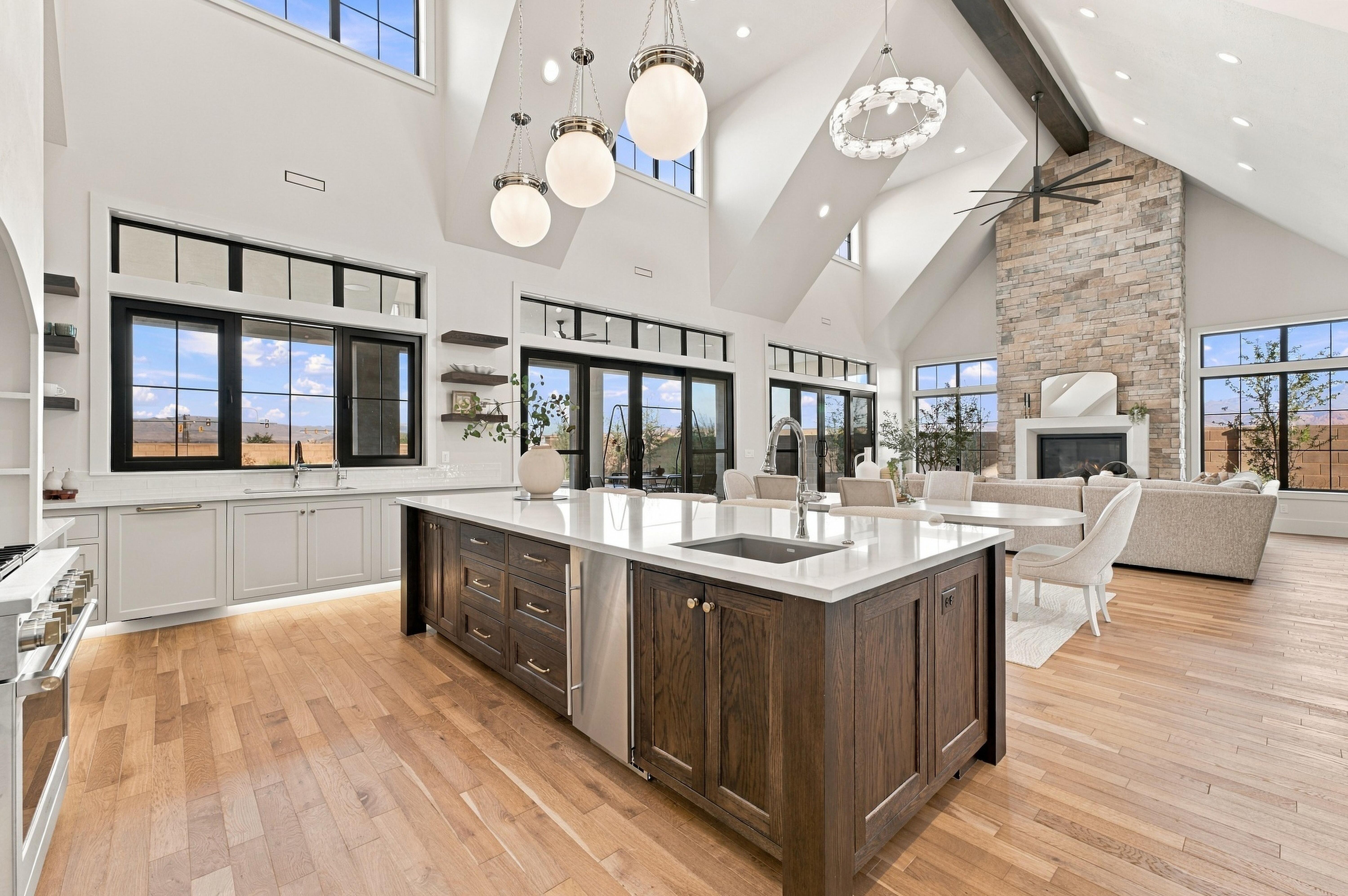 Open concept kitchen featuring vaulted ceilings