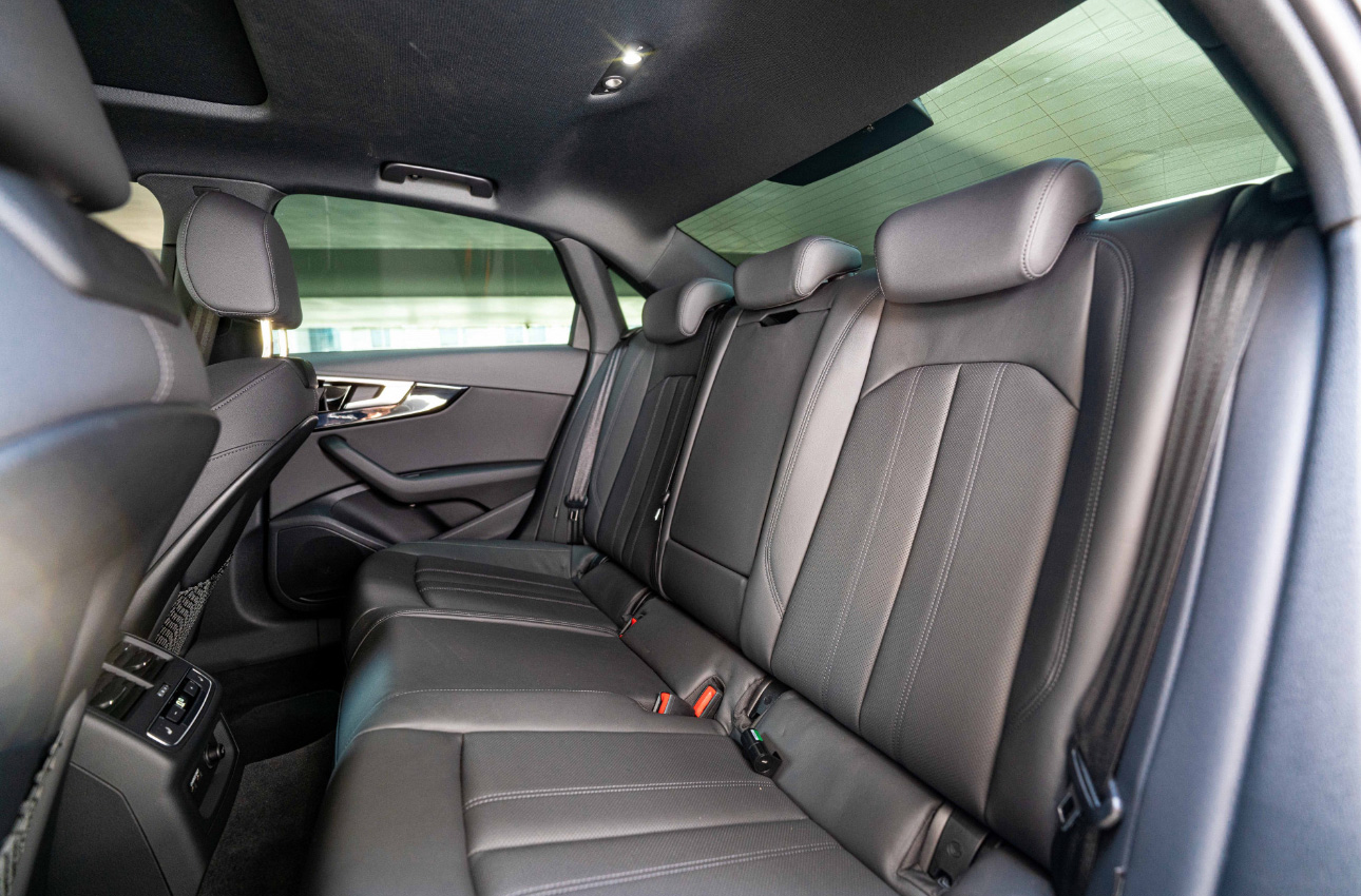 Luxurious car interior with black leather seats and modern design