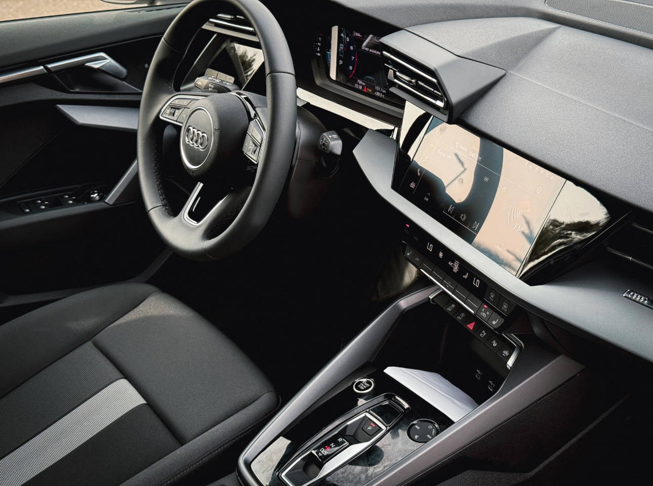 Modern Audi interior with digital dashboard and sleek black design