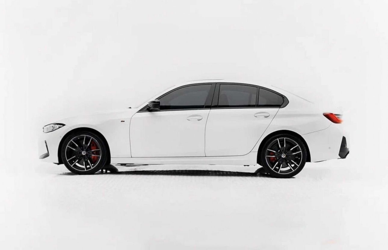 White BMW sedan with sporty design on minimalist white background