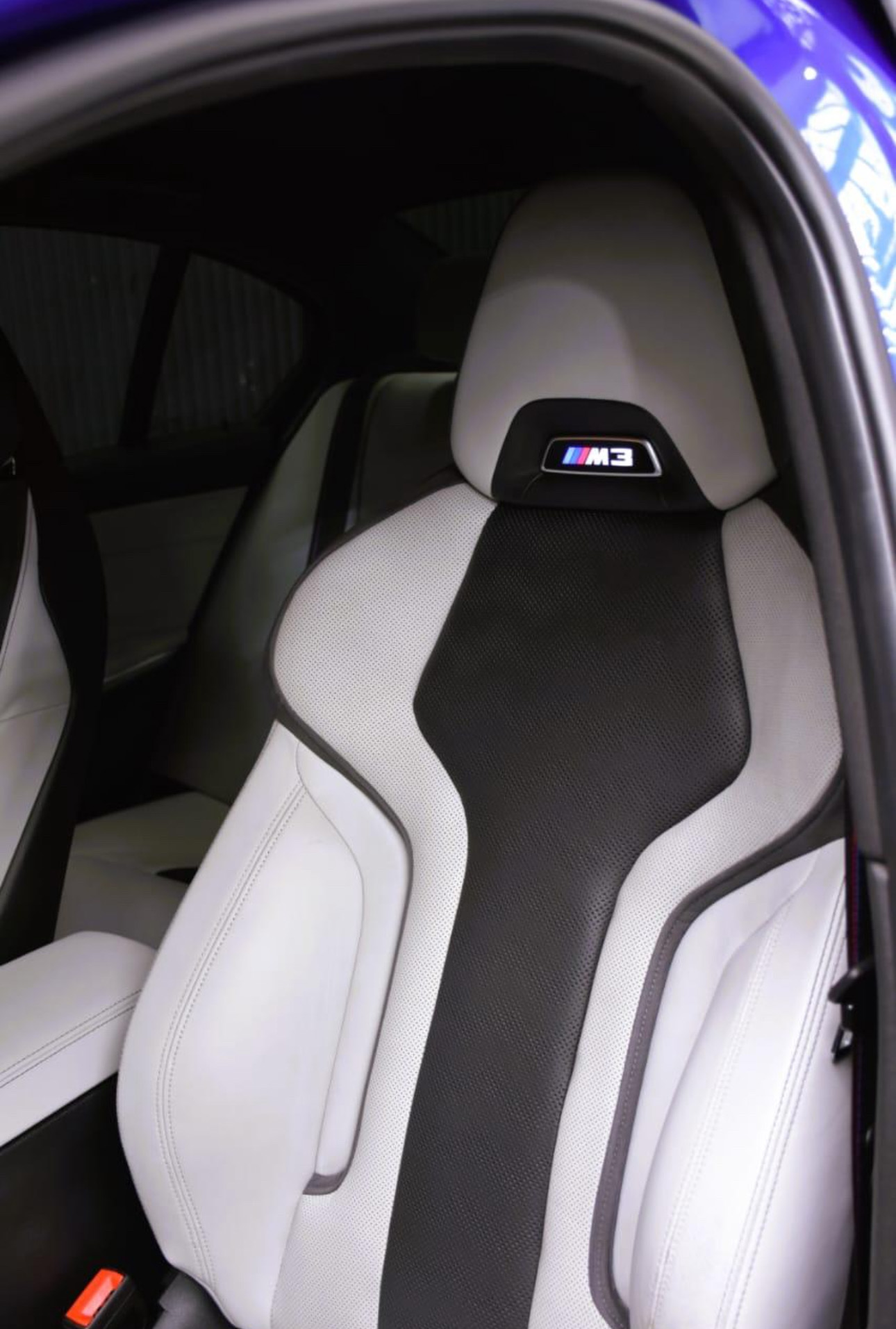 BMW M3 white and black sport seats with M logo