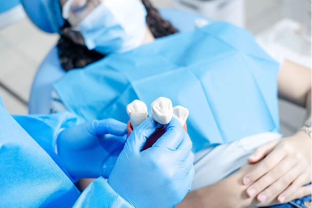 Dental surgery with suction and tools during oral treatment