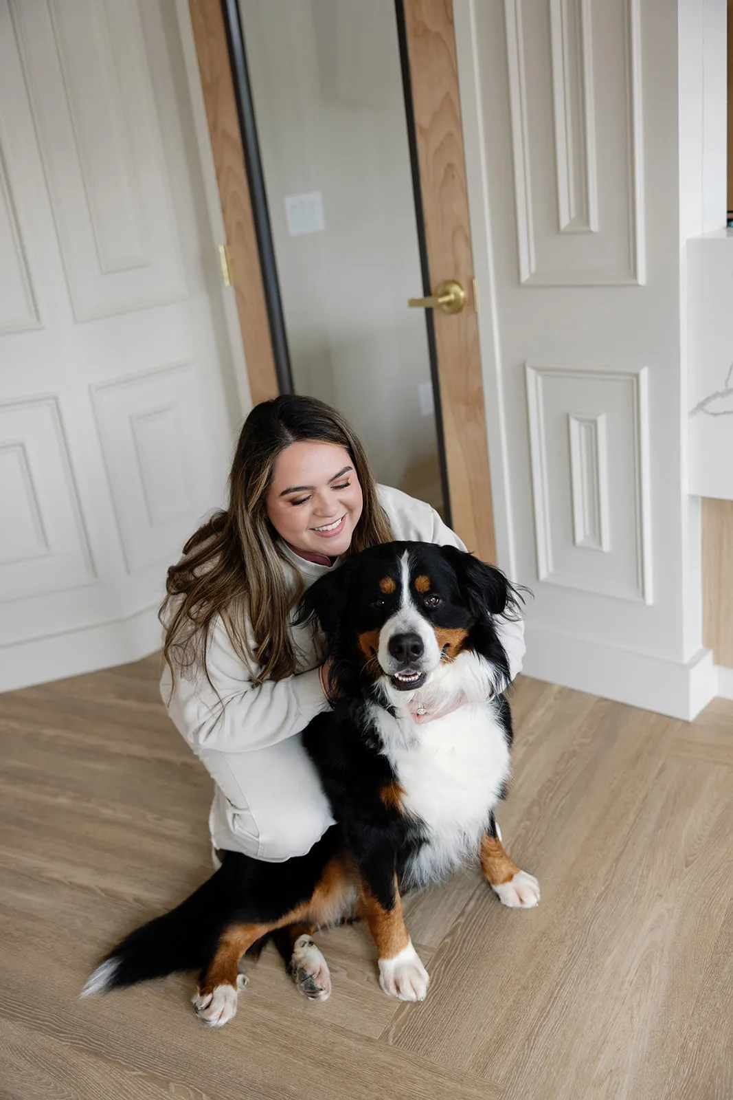 Dr. Alex Franco with a dog inside Method Modern Dentistry in Alpharetta, GA