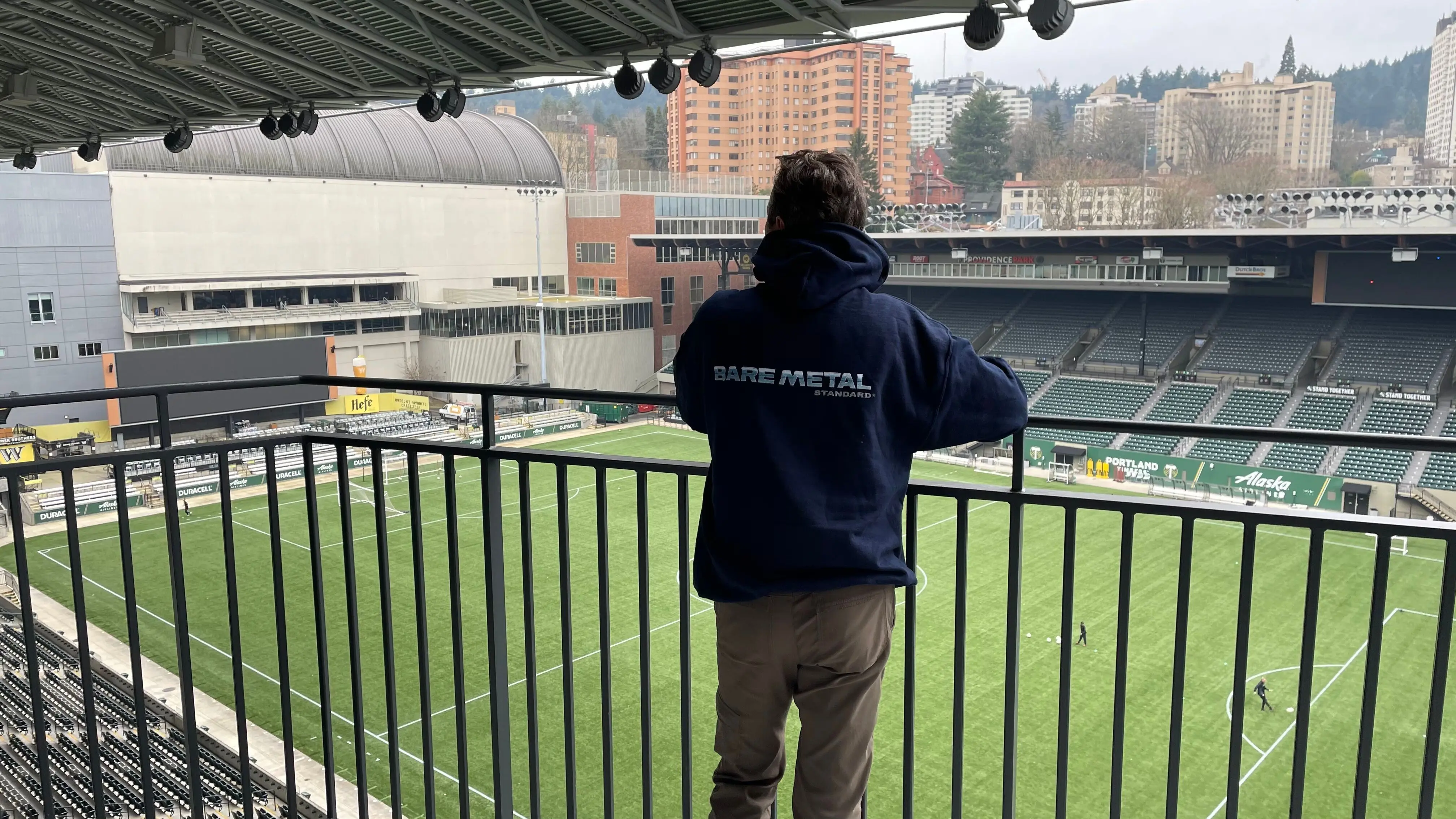 A Bare Metal Standard employee look at the providence park pitch
