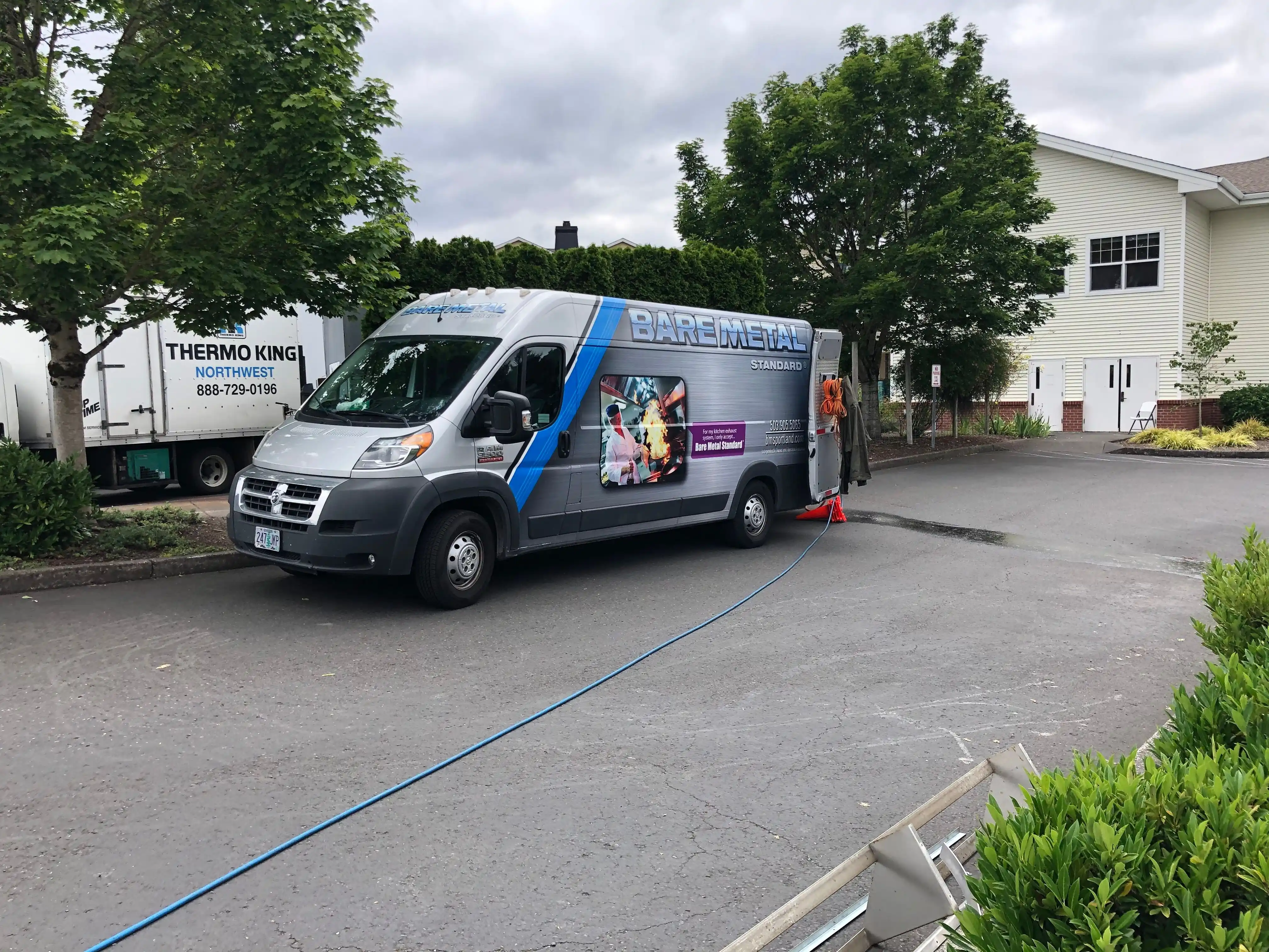 The Bare Metal Standard van at a job site