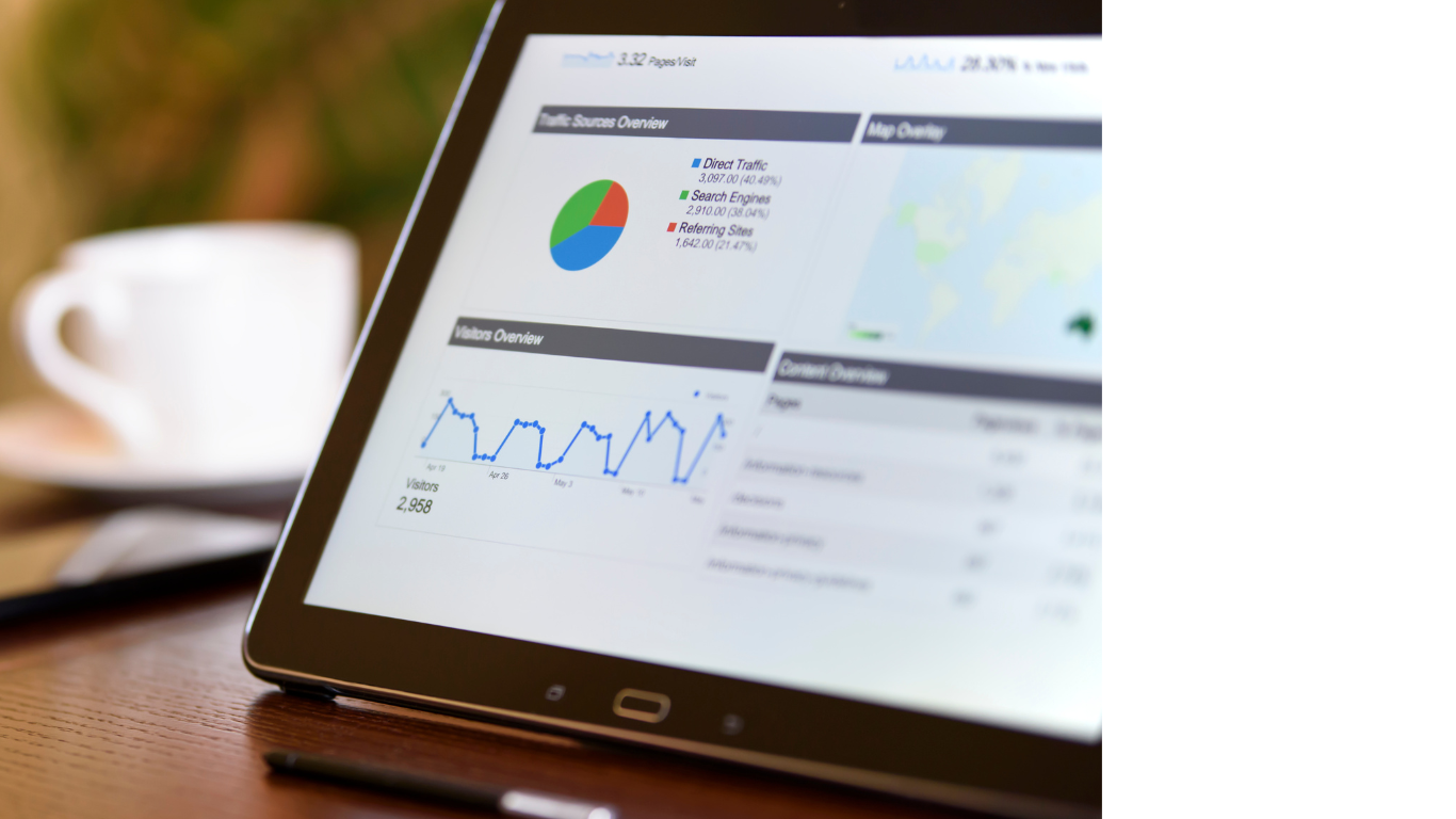 Analytics dashboard on a laptop showing performance metrics and growth data, illustrating how Robinson Digital's online growth system tracks and measures client visibility and marketing success.