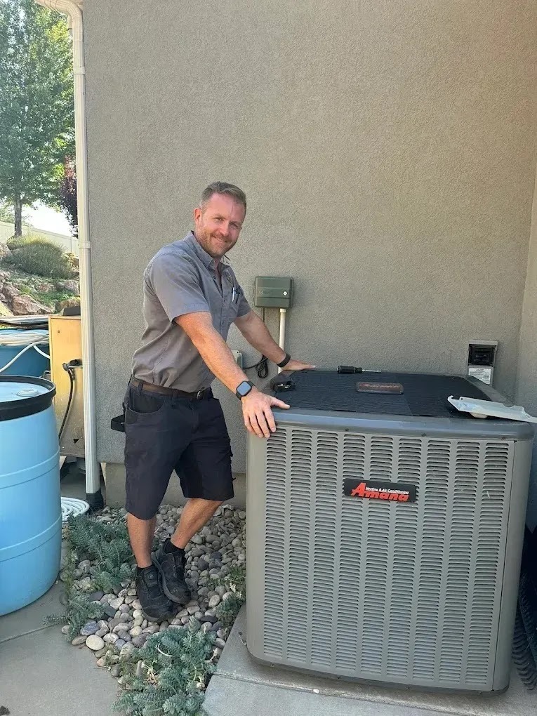 Family enjoying a comfortable living room with an air conditioning unit in the background