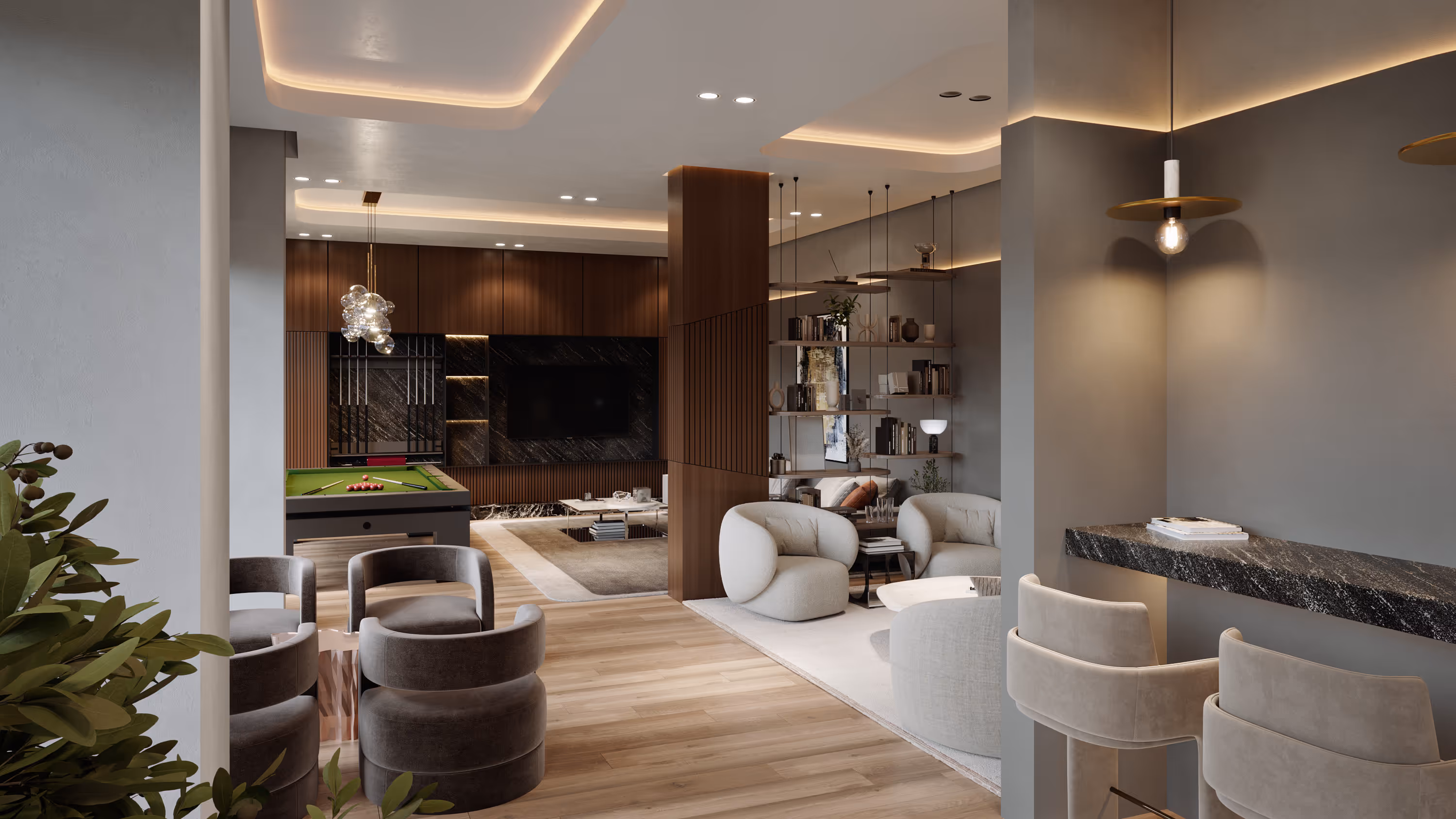 Modern living space featuring a pool table, circular armchairs, built-in shelves, and a bar area with marble countertop and pendant lighting.