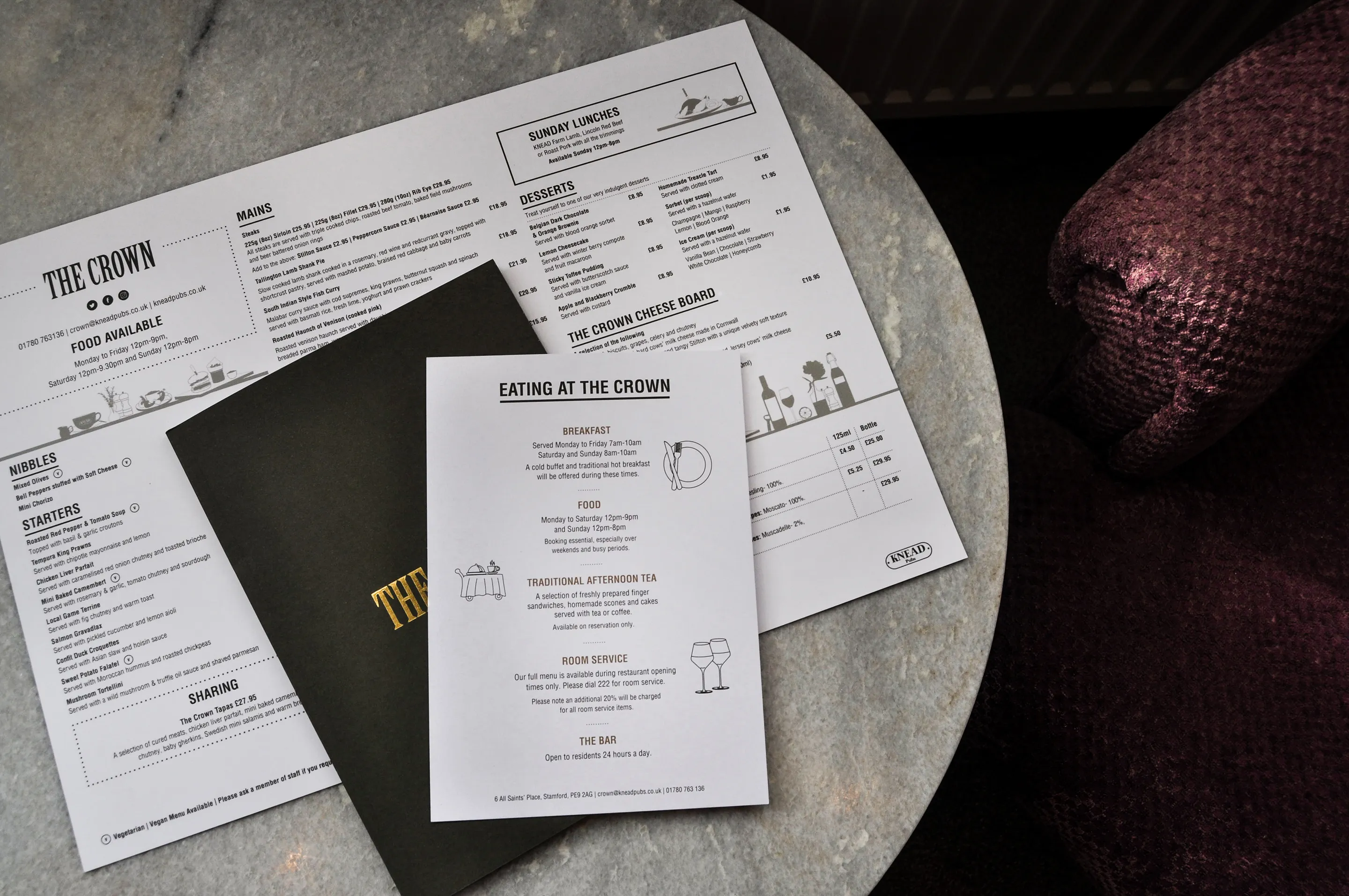 menu designs laid out on a pub table