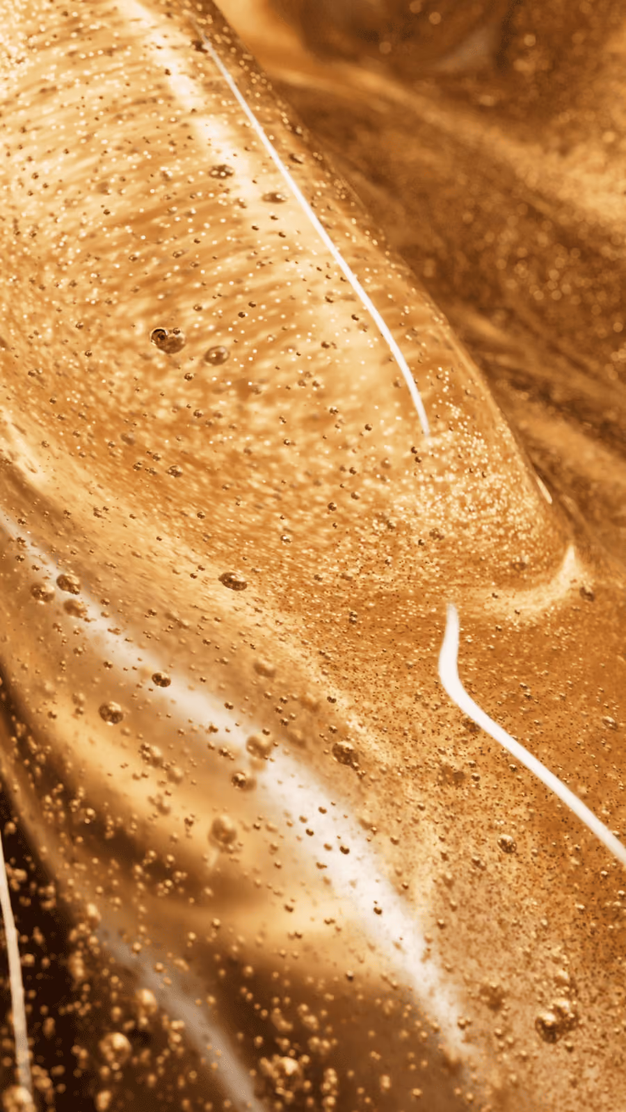 Golden Liquid with Particles