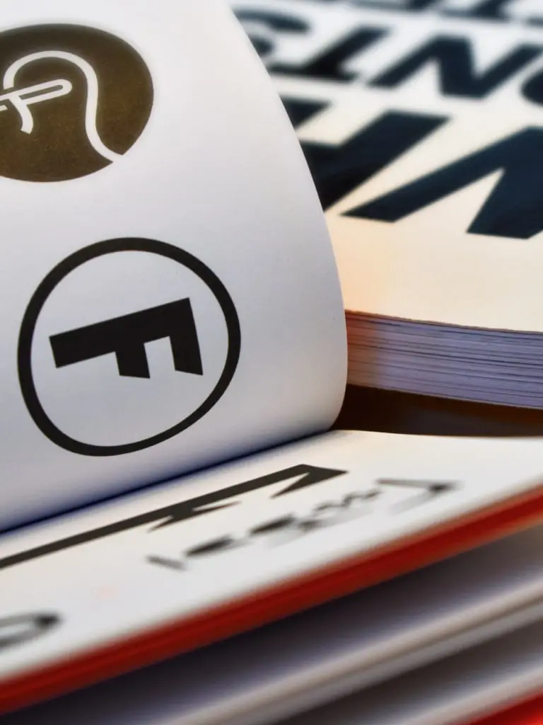 Typography book with an open page  showing letters
