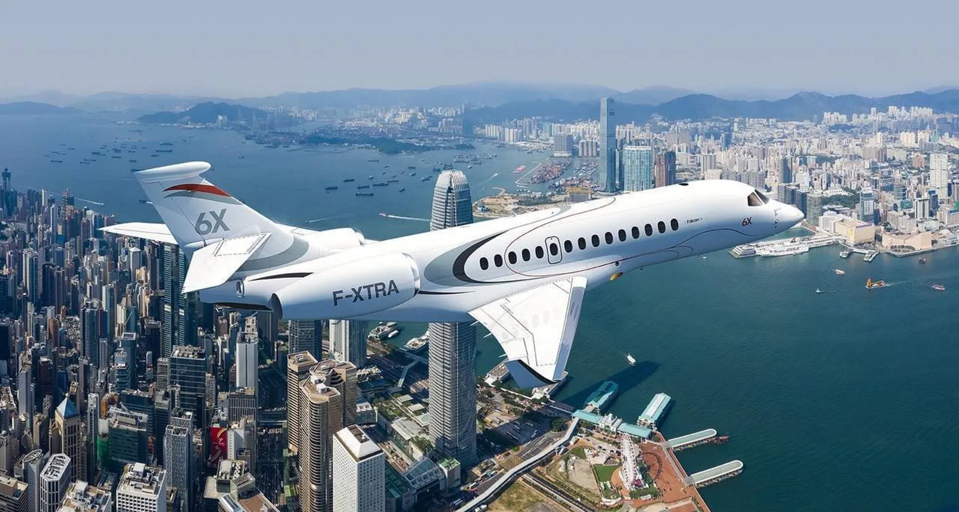 falcon 6x flying over hong kong