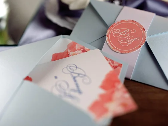 Elegant wedding invitation envelopes with coral wax seal for last minute event attendance charter