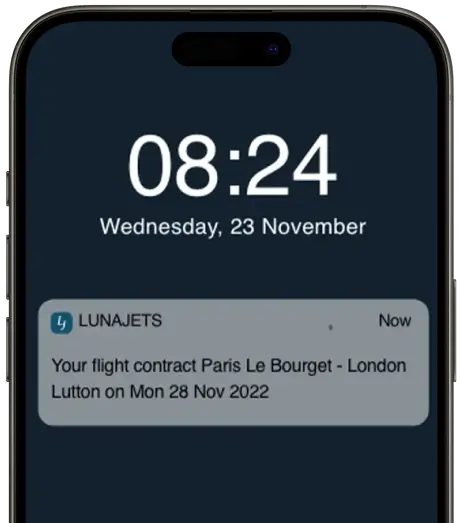 Schermata di blocco dello smartphone che mostra l'ora 08:24 di mercoledì 23 novembre con una notifica di LUNAJETS su un contratto di volo da Parigi Le Bourget a Londra Luton lunedì 28 novembre 2022.