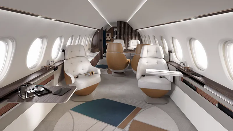 À l'intérieur du Falcon 10X : un aperçu de la cabine spacieuse, symbole de luxe et de confort inégalé dans l'aviation privée.