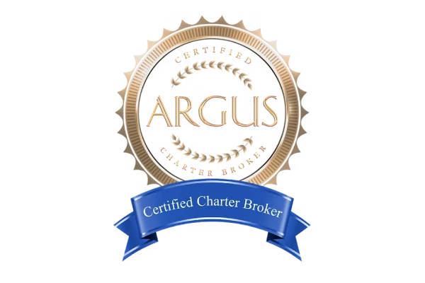 Luxurious private jet cabin with beige seats, glossy table and designer magazine