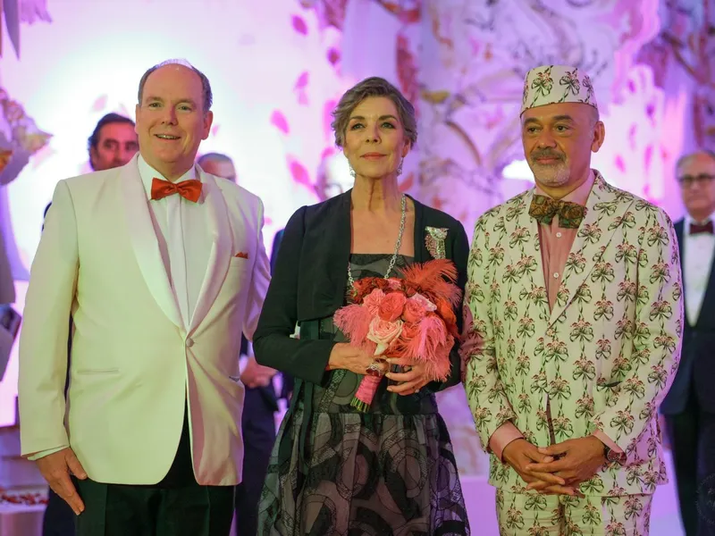 H.S.H. Prince Albert II, H.R.H. The Princess of Hanover and Christian Louboutin at the Bal de la Rose 2022 in Monaco.