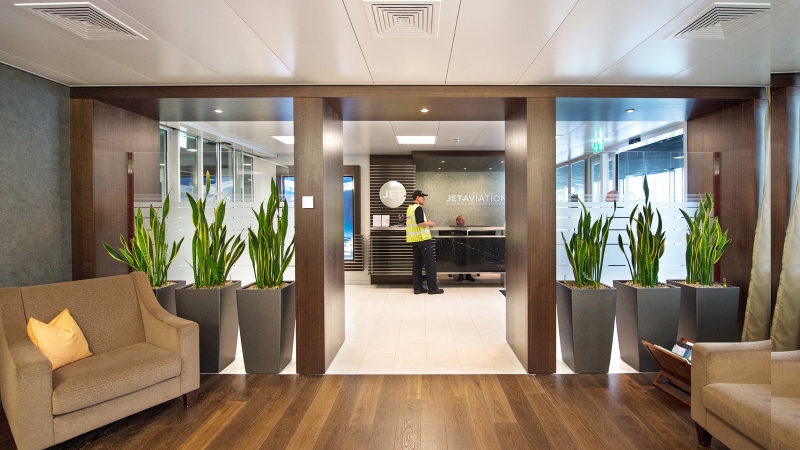 Jet Aviation’s FBO at Zurich Kloten Airport featuring a refined welcome lounge, reception area, and access to executive services for private jet passengers.
