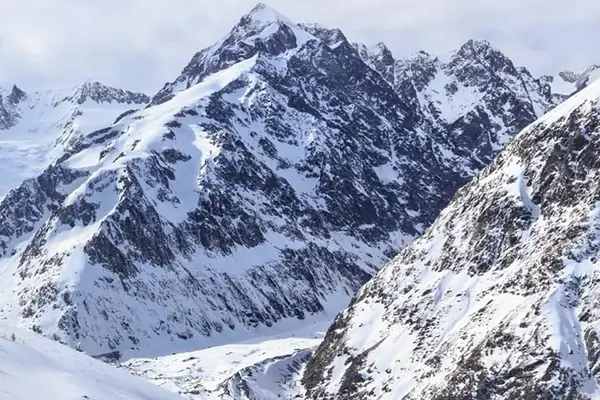 Photo of the snowy mountains of Courmayeur in the Aosta Valley in Italy