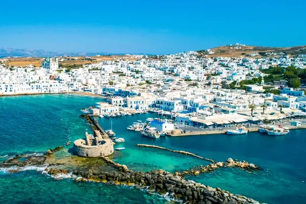 Ancient ruins of Venetian castle in the harbor of Naoussa town, view from above, Paros island, Greece
