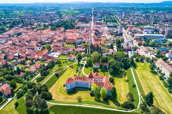Aerial view of Osijek, Croatia with Tvra fortress and medieval old town surrounded by green landscapes and Danube River