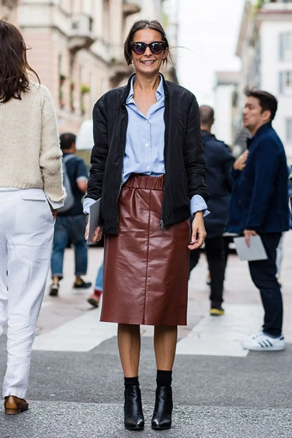 Minimal street style outfit with black leather straight skirt and knit, showing the vintage leather skirt as a clean and versatile base.