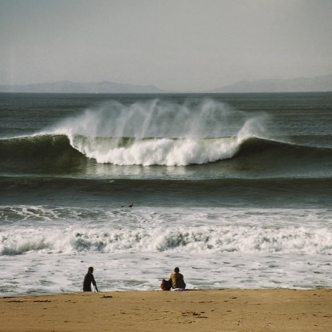 Wave breaking at Surfside Colony, California.